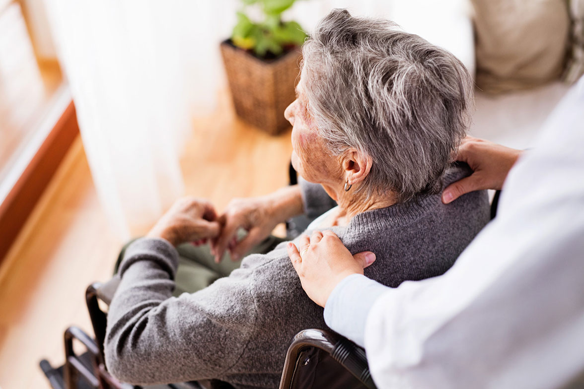 Health visitor and a senior woman.