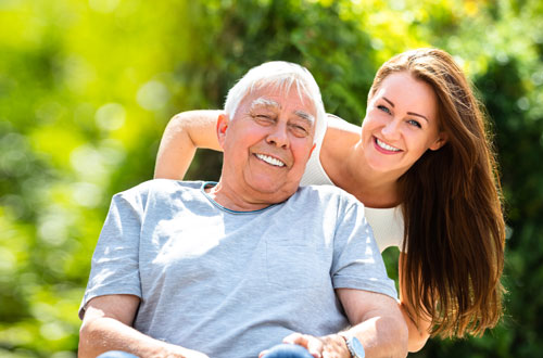 Father and daughter smiling