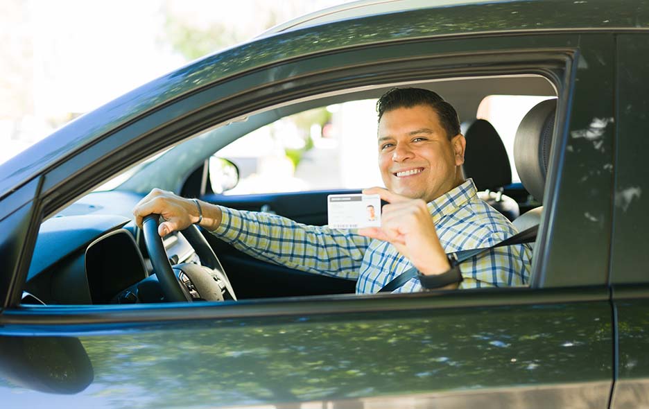 a driver showing their license